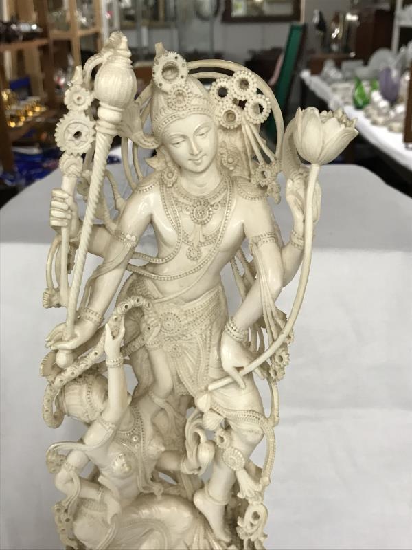 An ivory figure of Durga on a teak base with radiocarbon dating measurement report dated February - Image 11 of 15