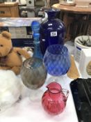 A quantity of coloured glass items including decanter