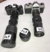 A Chinon CM-4 camera, Chinon CS camera with lenses, Optomax 1:45 f=200mm, Optomax 1:5.