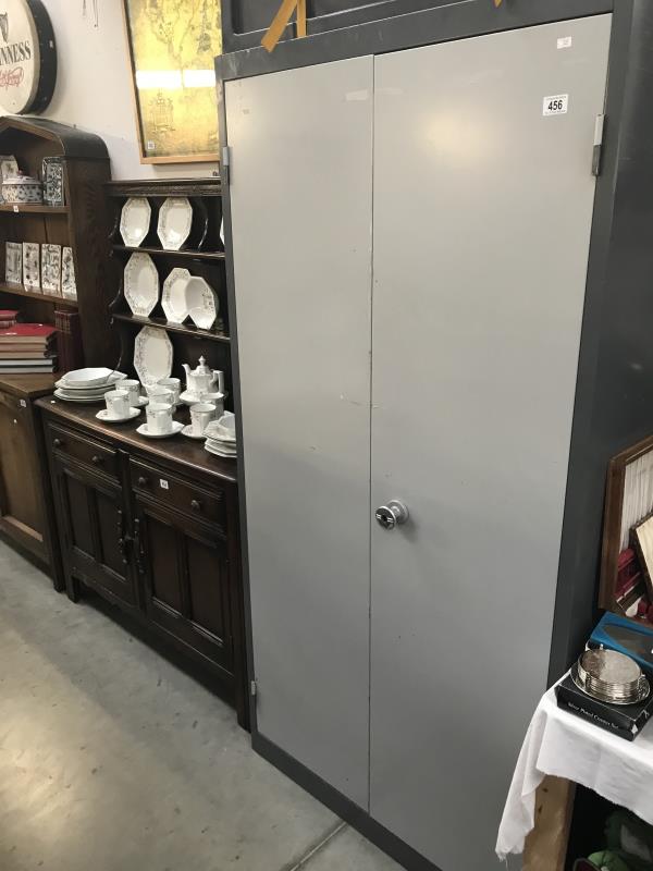 A metal 2 door cabinet