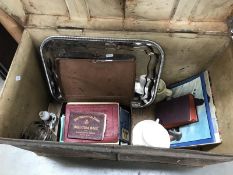 An old tin trunk and contents including small case,