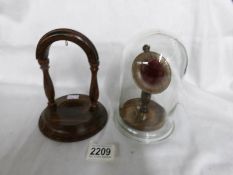 2 wooden pocket watch stands (one having an outdoor light glass dome).