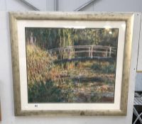 A framed & glazed print of Monets bridge at Giverny