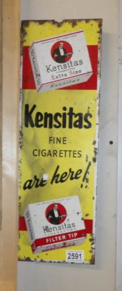 An enamel sign for Kensitas cigarettes (approximately 6.75" x 20").