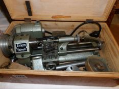 A Selecta Unimat lathe with accessories in wooden box.