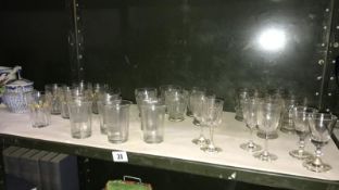 A quantity of vintage drinking glasses