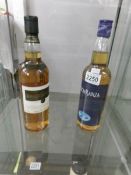 A bottle of Lachruan 12 year old malt whisky and a bottle of Lochranza blended whisky.