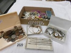 A mixed lot of costume jewellery and watches etc.