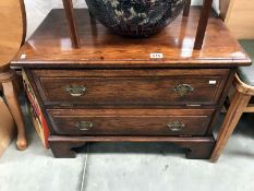 A dark oak 2 drawer chest of drawers