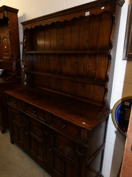 A dark oak dresser.