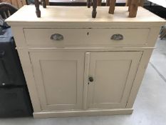A shabby chic painted pine cupboard
