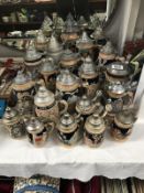 Two boxes of German beer steins including musical - various sizes