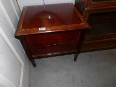 A Victorian mahogany inlaid commode.