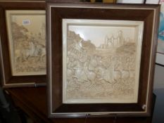 2 framed medieval scene wall plaques.