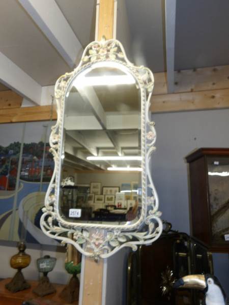 A metal framed mirror.