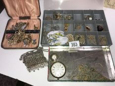 A collection of costume jewellery and watches