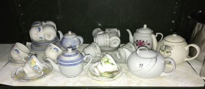 A shelf of porcelain cups,