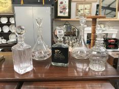 A pair of Victorian glass decanters and 3 others