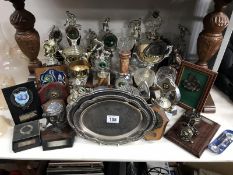 A quantity of sporting trophies - mostly bowls
