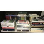 35 assorted signed novels including Jeffrey Archer, Brian Freemantle, Ben Okri, John Le Carre,