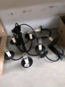 A 5 arm wrought iron chandelier and three 2 arm wall lights