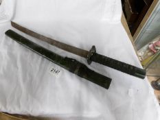 An old Japanese sword with Tsuba.