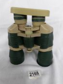 A pair of 10 x 50 binoculars.