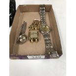 A Guess wristwatch and 2 others