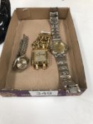 A Guess wristwatch and 2 others