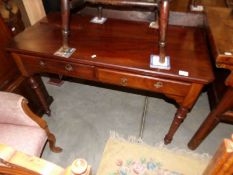 An Edwardian mahogany 2 drawer desk,.