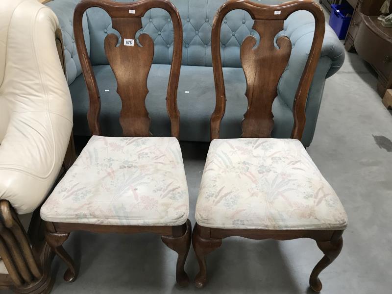 A pair of Edwardian high back dining chairs