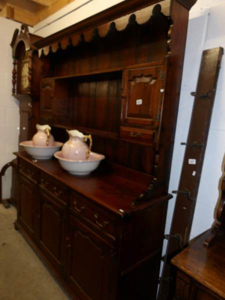 A dark oak dresser.