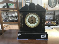 A black slate mantle clock for restoration