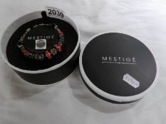 A boxed Mestige' bracelet with Swarovski crystal.