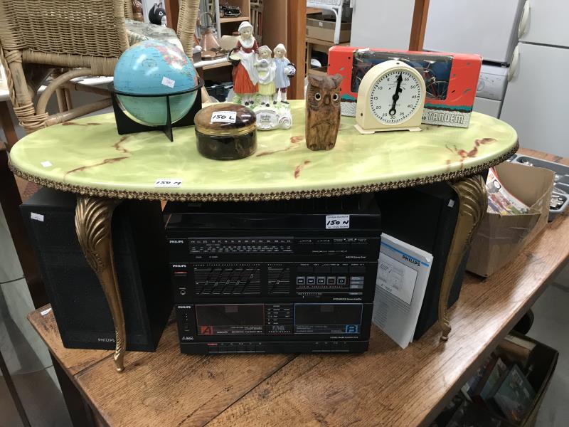 A coffee table with faux marble plastic top