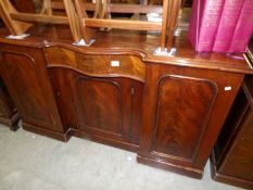 A Victorian mahogany sideboard.