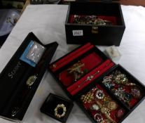 A jewellery box with costume jewellery and watches including boxed Srauer Graves wristwatch.