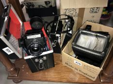 A Mamiya 645 camera and accessories