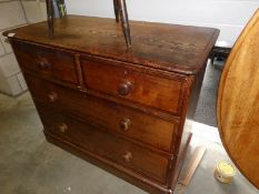 A pitch pine 2 over 2 chest of drawers.