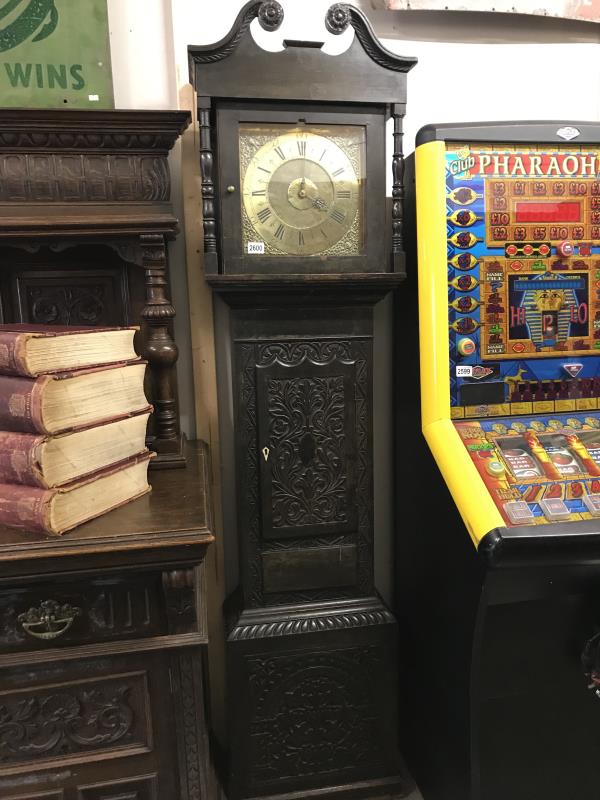 A 19th century carved oak long case clock with brass dial. - Image 2 of 8