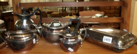 A 3 piece silver plated tea set, a silver plated tureen and a silver plated coffee pot.