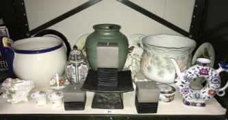 A large shelf of pottery and porcelain including Coalport collector's plates