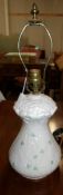 A Belleek table lamp base.