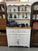 A shabby chic kitchen oak dresser