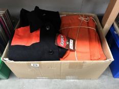 A box of work clothes including donkey jacket - mostly new