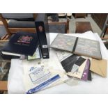 2 Stanley Gibbon stamp albums & a stock book with some British Elizabeth II stamps