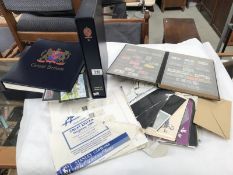 2 Stanley Gibbon stamp albums & a stock book with some British Elizabeth II stamps