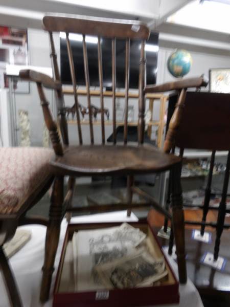 A 19th century oak Windsor chair.
