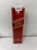 A boxed bottle of Johnny Walker Red Label old scotch whisky.