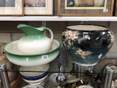A large floral painted planter and a large jug and basin